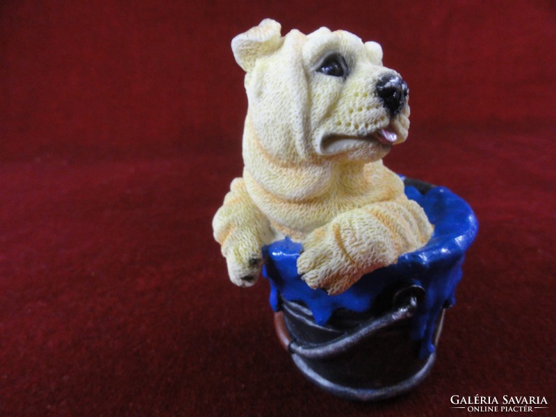 Ceramic dog in a blue bucket. He has!