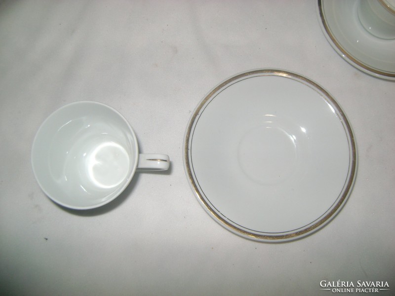 Retro porcelain coffee set with gilded rim
