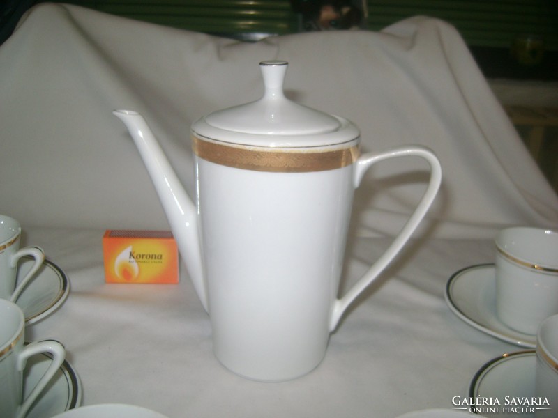 Retro porcelain coffee set with gilded rim