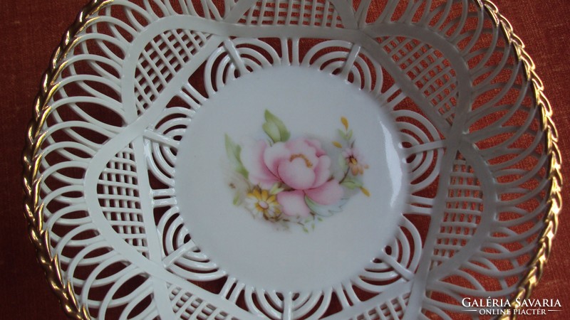 Porcelain decorative bowl with a lacework edge, braided gold rim, baby rose pattern.