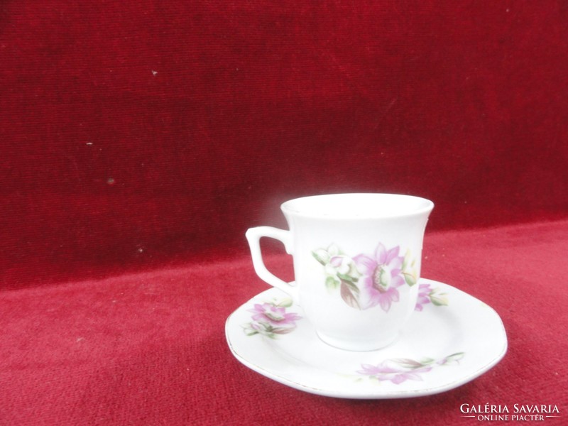 Liling porcelain coffee cup + placemat with pale purple flowers. He has!