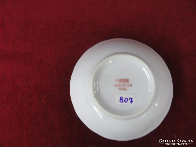 Liling Chinese porcelain bowl with wavy edge and pale purple flower. He has!