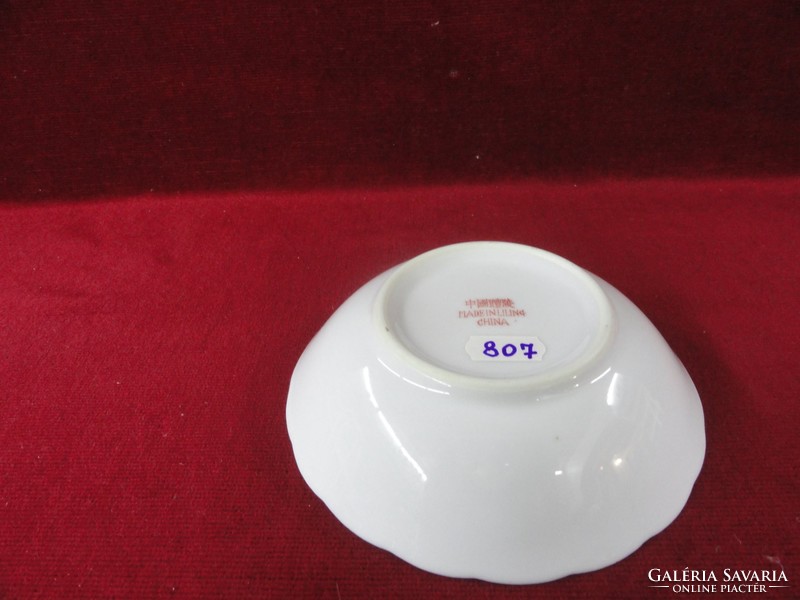Liling Chinese porcelain bowl with wavy edge and pale purple flower. He has!