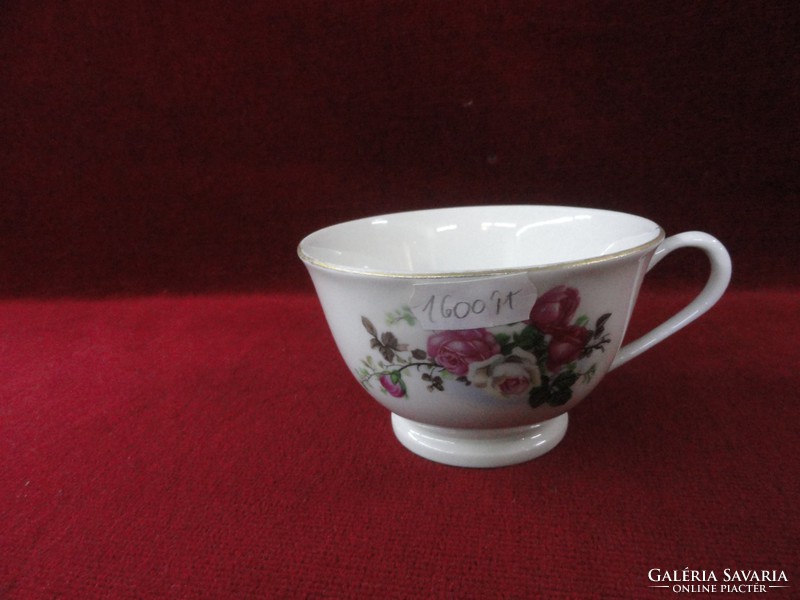 Porcelain tea cup decorated with a wonderful bouquet of roses. He has!