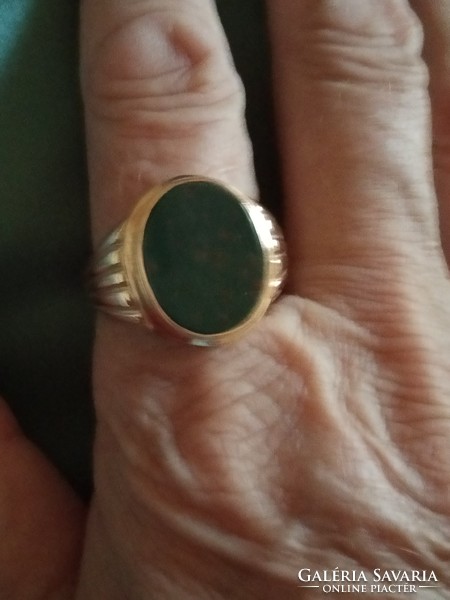 Gold men's signet ring with precious opal stone