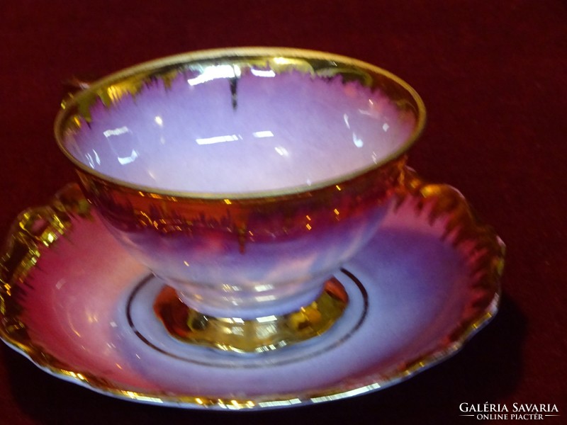 Eigl quality porcelain, tea cup + saucer. Richly gilded with cyclamen color. He has!
