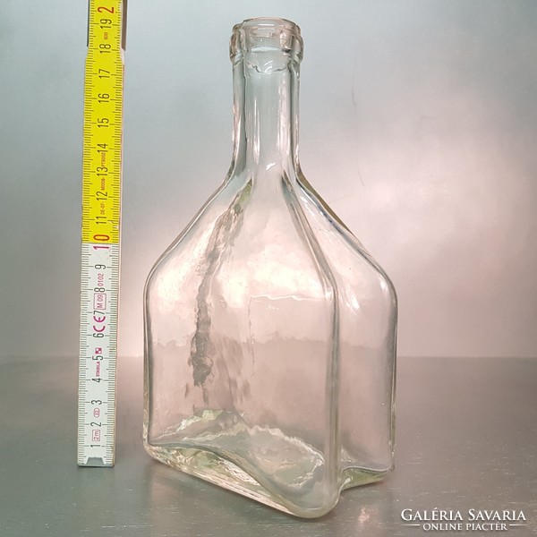 Colorless, medium-sized, concave-sided liquor bottle (854)