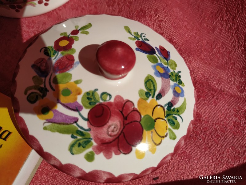 A beautiful spice holder with a flower pattern