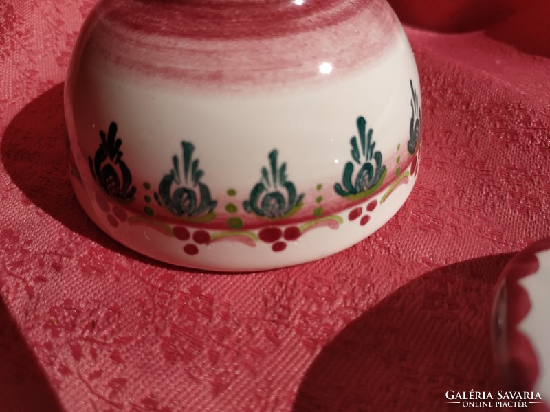 A beautiful spice holder with a flower pattern