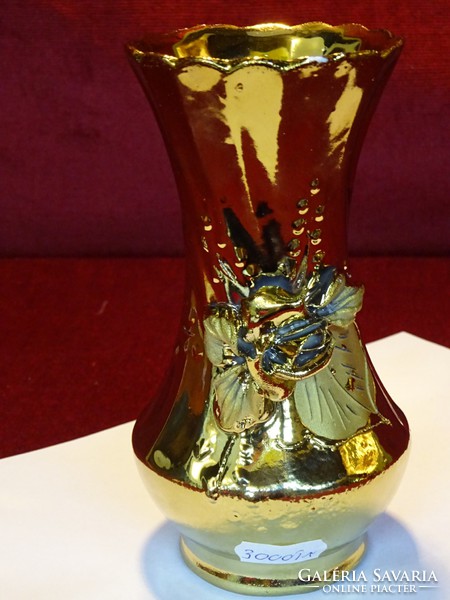 Porcelain gilded vase, with a convex rose pattern, 15 cm high. He has!