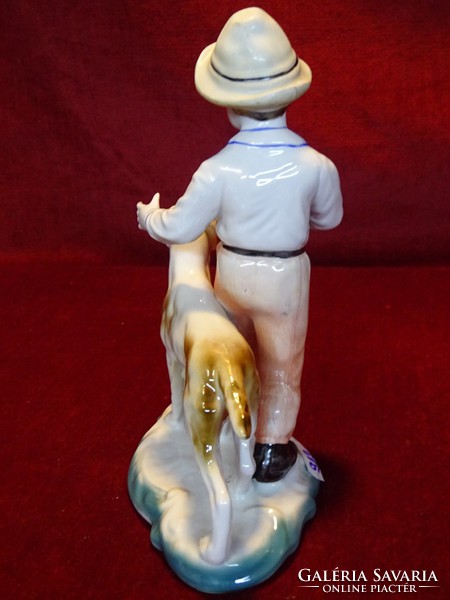 Crown shelf fine porcelain, boy with dog, height 20 cm. He has!