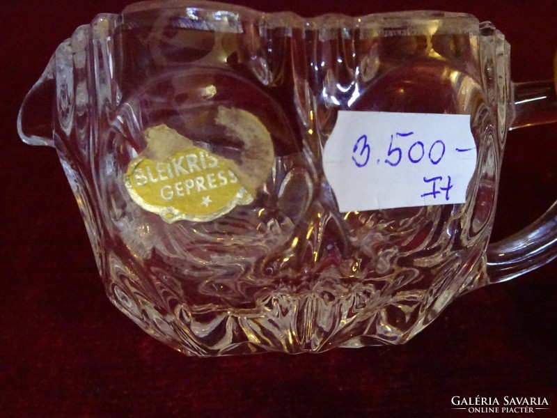 Lead crystal honey pourer with factory label. German, original, core. 5 Cm dia 8.5 Cm.