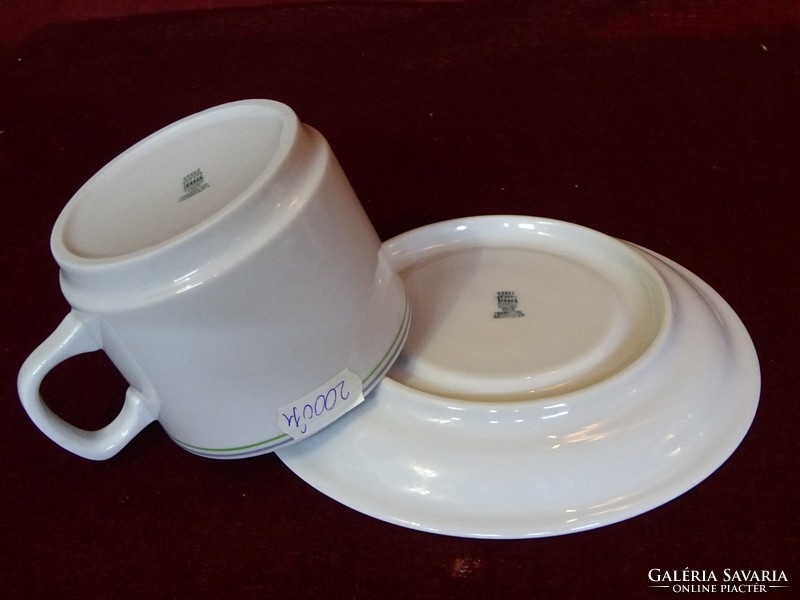 Zsolnay porcelain tea cup + saucer, with pale green stripe. He has!