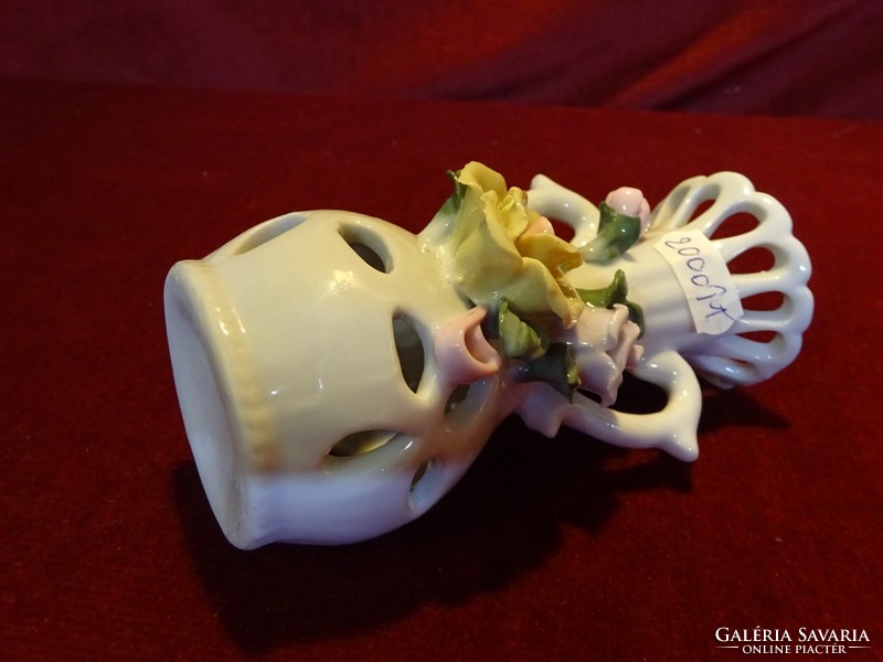 Candle holder with rose pattern, 12 cm high. He has!