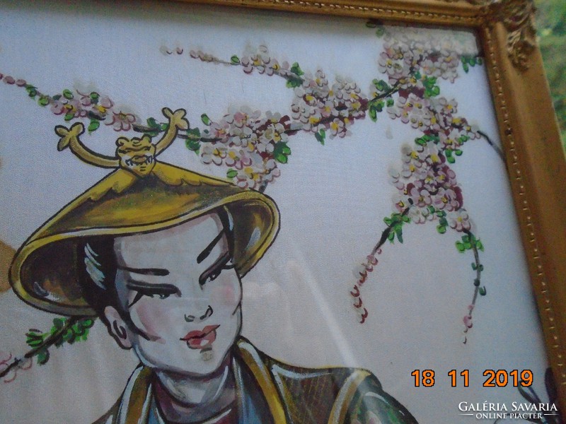 Portrait of a young lady playing music with a calligraphic sign in a Vietnamese painting on silk in a blonde frame