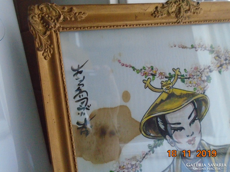 Portrait of a young lady playing music with a calligraphic sign in a Vietnamese painting on silk in a blonde frame