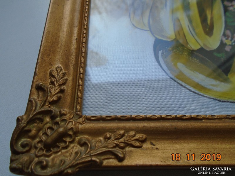 Portrait of a young lady playing music with a calligraphic sign in a Vietnamese painting on silk in a blonde frame