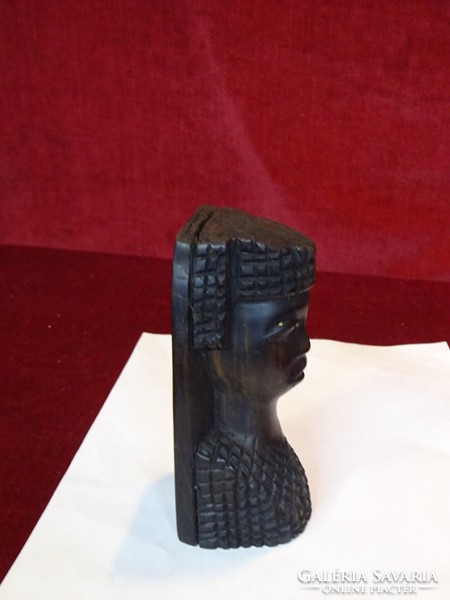 African wooden statue depicting a man, height 13.5 cm. He has!