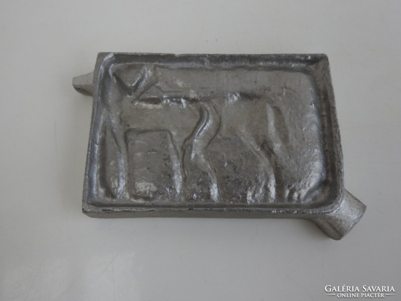 Old aluminum plastic ashtray depicting horses