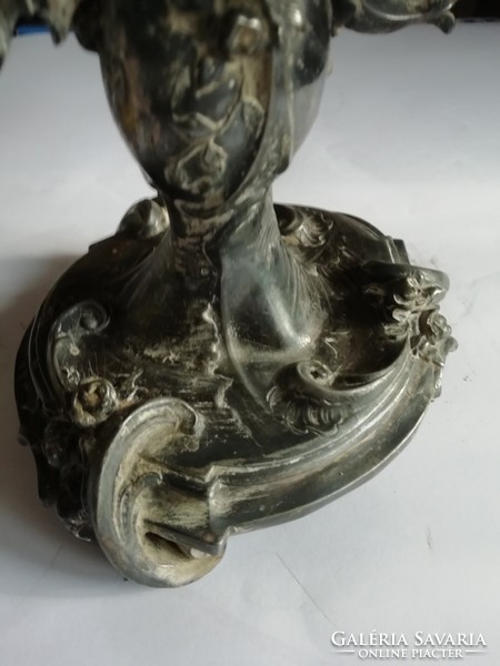 Baroque tin silver plated candlestick.