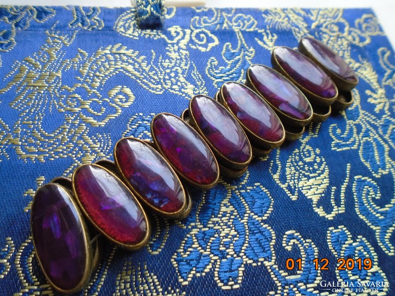 Fire-gilded bronze oval socket bracelet made of playful purple enamel beads