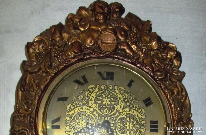 Hermle 241-030 weight motor wall pendulum clock with putt motif