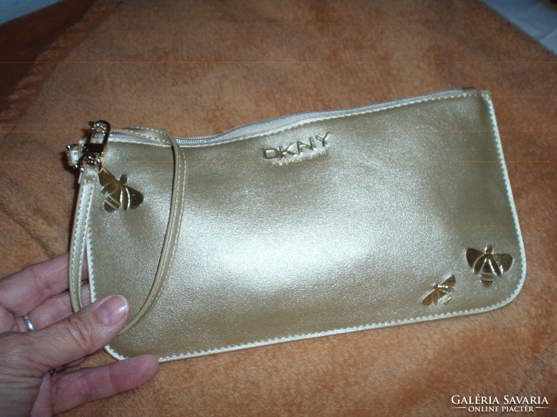 Dkny gold color cosmetic bag