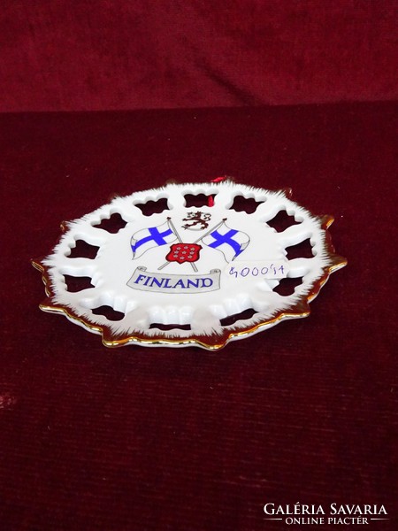 Swedish porcelain wall decoration with Finnish flag. With a diameter of 12 cm. He has!