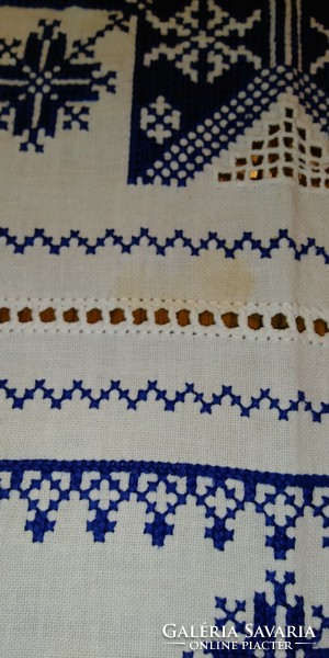 A beautiful, very showy antique tablecloth, made with various embroidery techniques