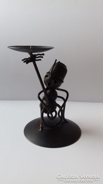 Candlestick with ant figure