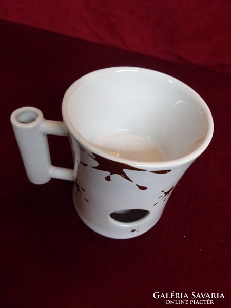 Unique porcelain evaporator with 12.5 cm high brown stain pattern. He has!