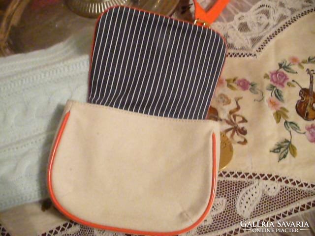 A smaller-sized women's branded bag