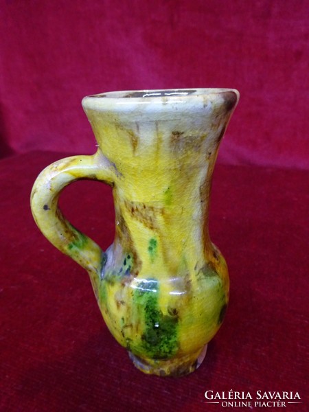 Ceramic mug, 12 cm high, in different colors. He has!