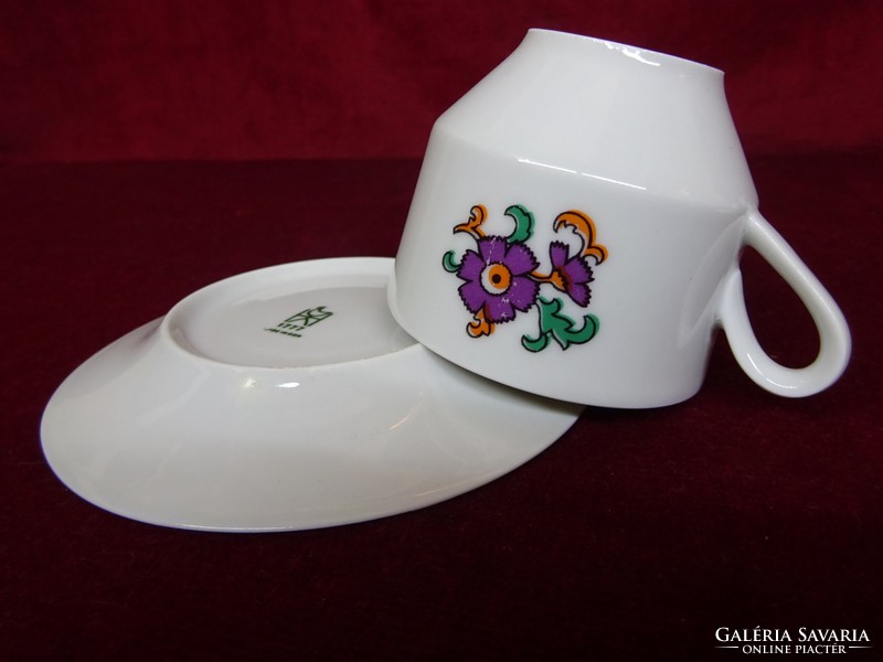 German porcelain, coffee cup + placemat. Showcase quality. He has!