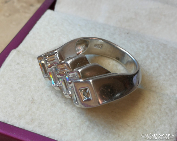 Modern, special design silver ring with brilliant gemstones