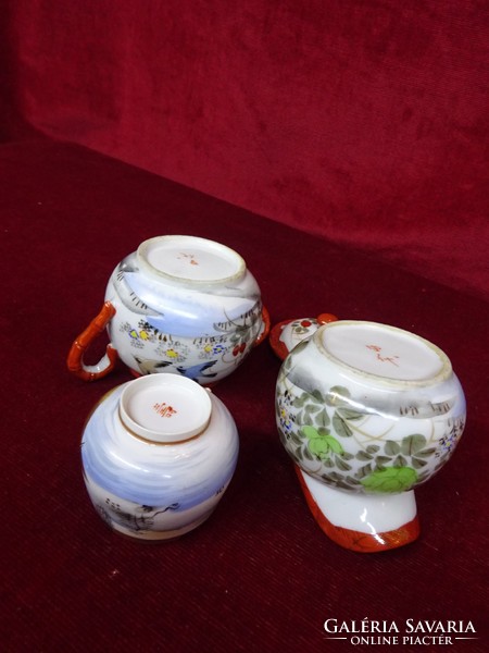 Japanese porcelain sugar bowl, milk pourer, coffee cup. Antique hand painted pieces. He has!