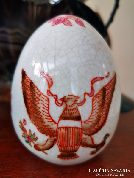 Antique porcelain egg with griffin bird