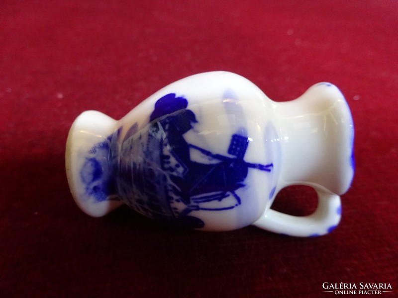 Dutch porcelain mini jug with cobalt blue windmill, 5.2 cm high. He has!