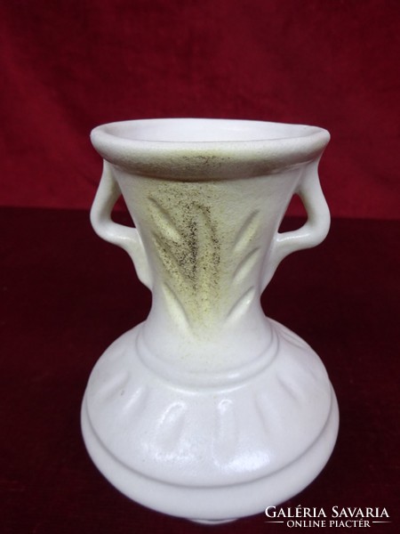 Porcelain vase with two handles, height 14.5 cm. He has!