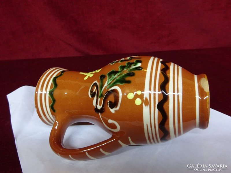 Hand-painted ceramic jug, height 16 cm. He has!