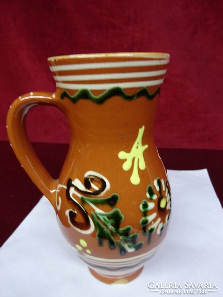 Hand-painted ceramic jug, height 16 cm. He has!