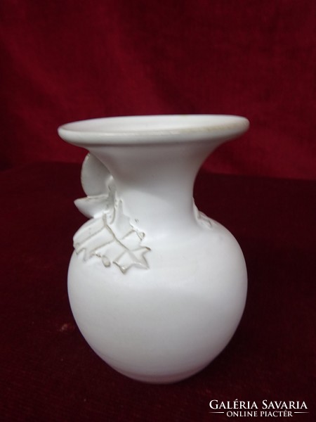 Glazed ceramic vase with rose decoration, height 10 cm. He has!