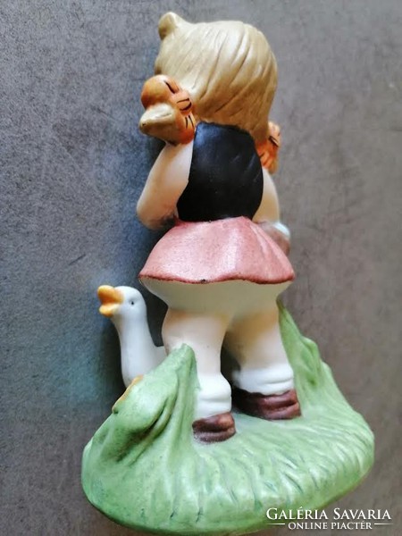 Little girl with goose, charming biscuit figure