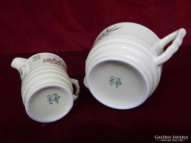 Antique German quality porcelain sugar bowl and milk spout with gold decoration. He has!