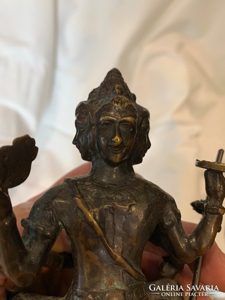 Bronze four-faced goddess of oriental mythology