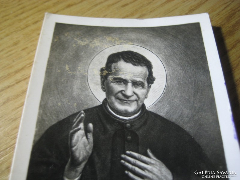 Don bosco. The man of the big heart / this is one of him. -I on the facade of the school /