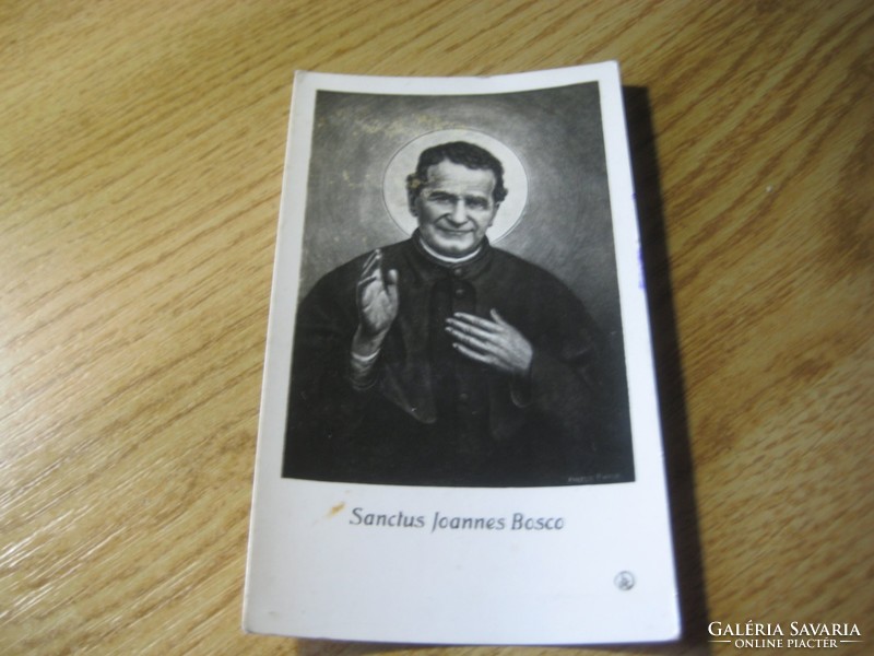 Don bosco. The man of the big heart / this is one of him. -I on the facade of the school /
