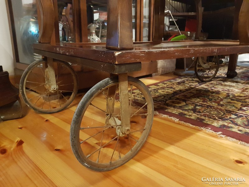 Large, wheeled cart in good condition