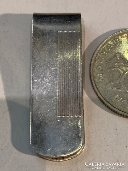 Silver coin pinch