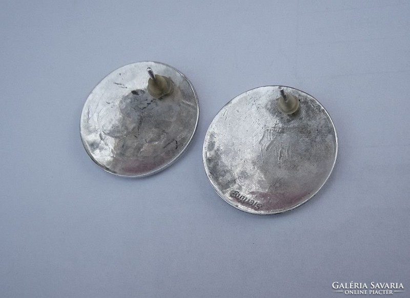 Large round silver earrings with Native American motif